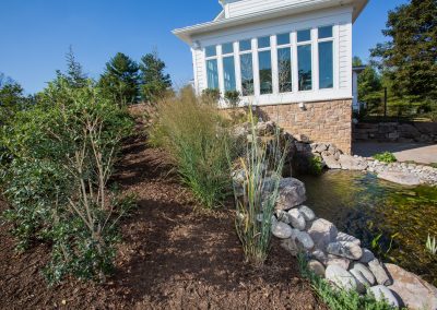 Landscaping with waterfall by Frederick Landscaping Maryland